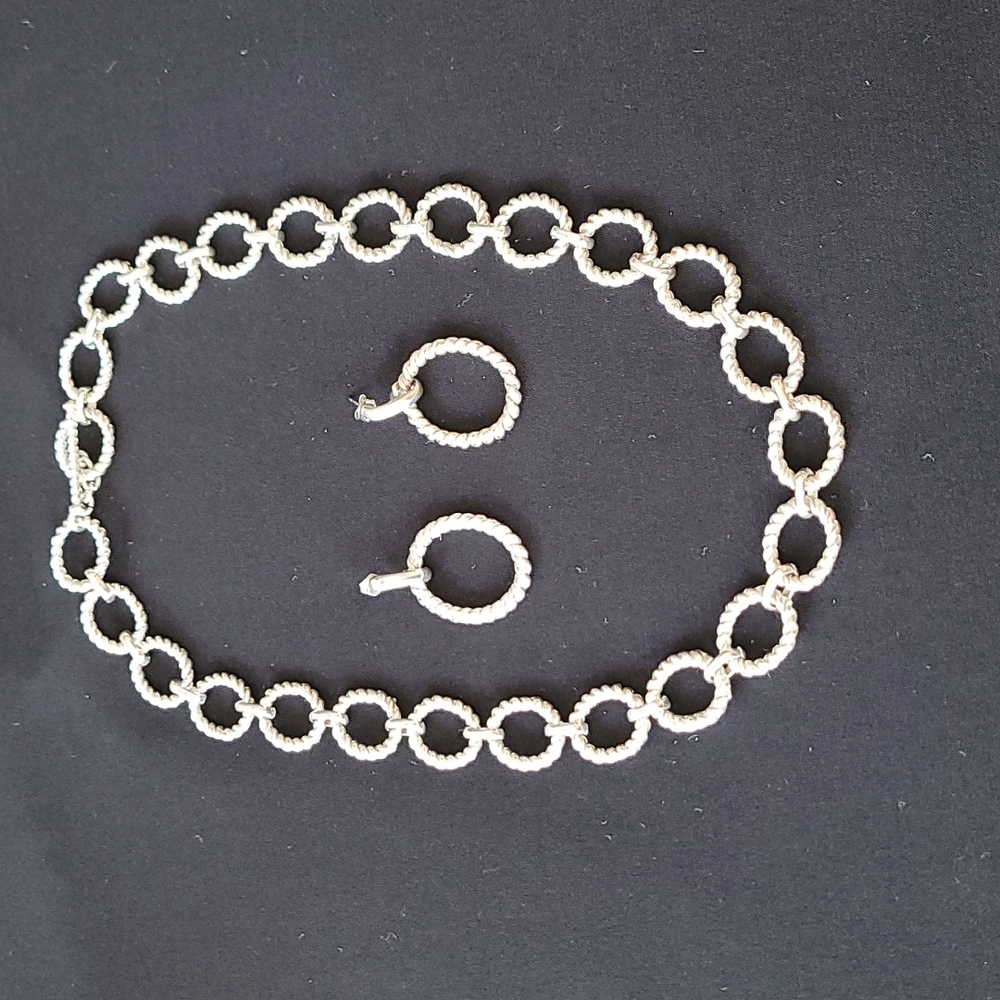 Silver tone necklace and earrings